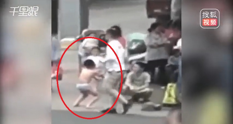 Chinese Mom Makes Son Strip to His Underwear and Squat in Public