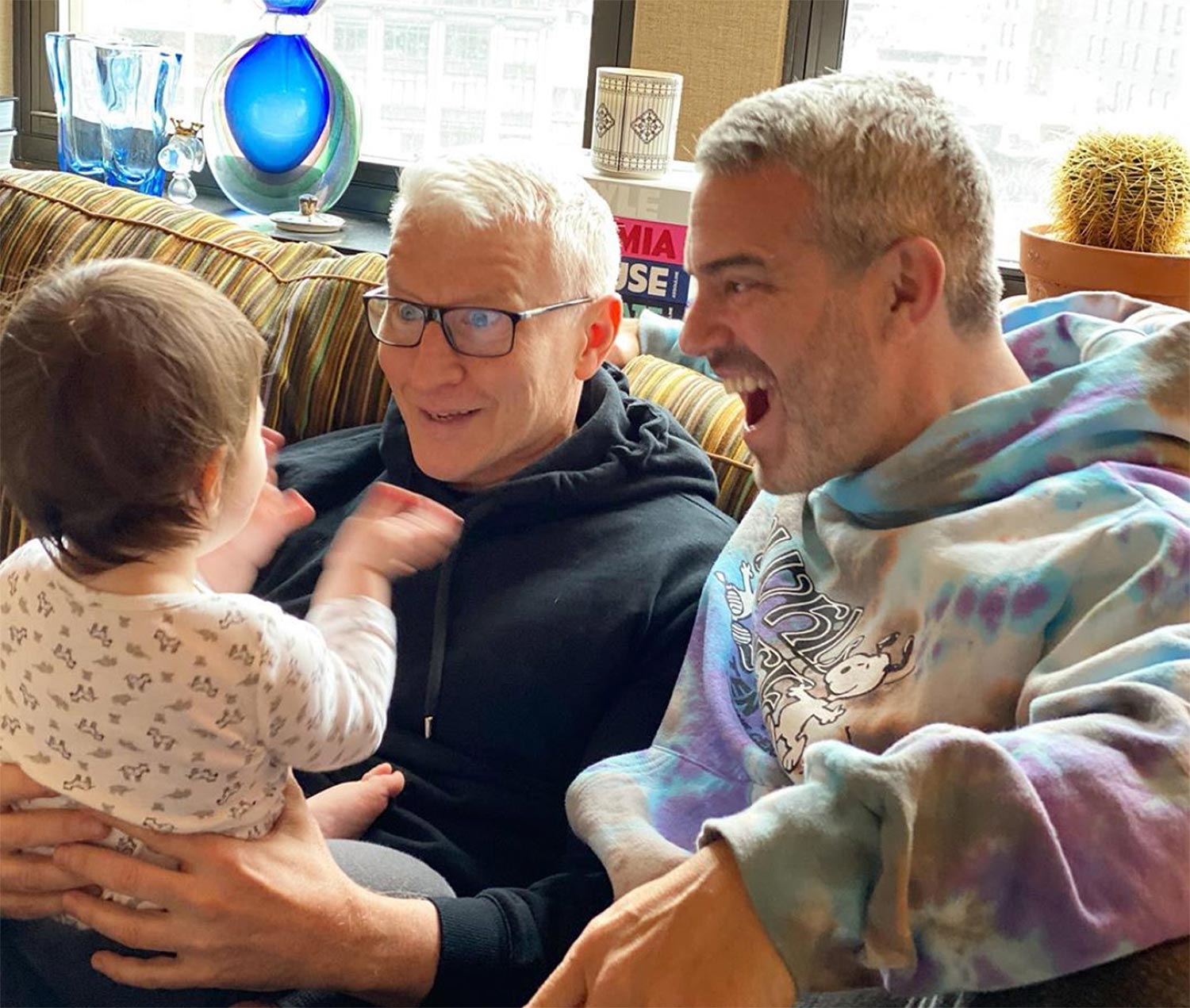 Andy Cohen's Son, 10 Months, Knocks Off Anderson Cooper's Glasses Ahead